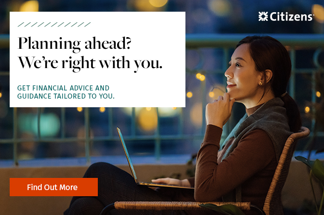 Woman sitting on chair with laptop