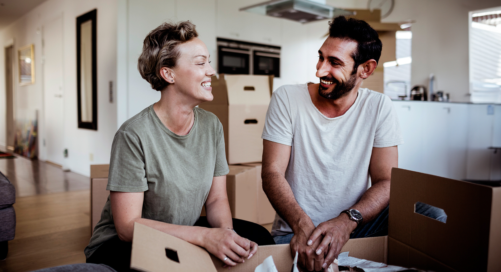 Two people smiling at each other