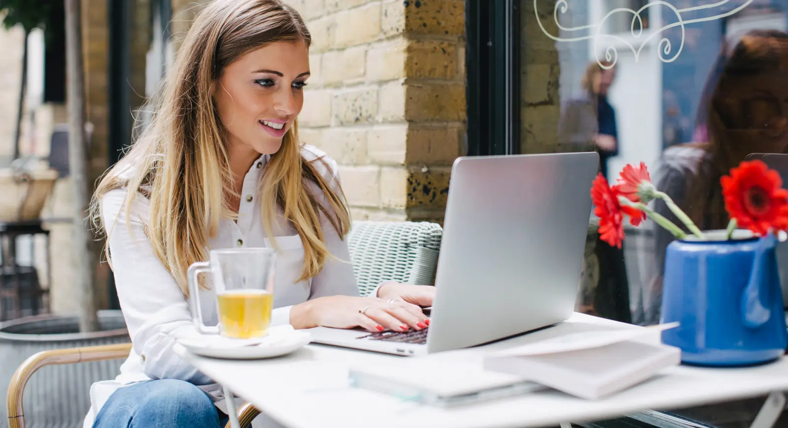 woman on laptop using public wifi