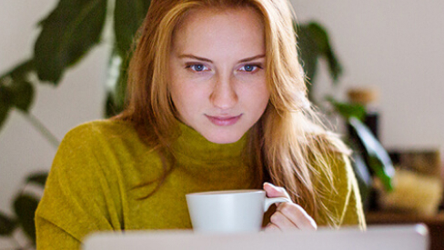Woman looking at computer screen