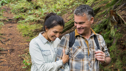 man and woman hiking