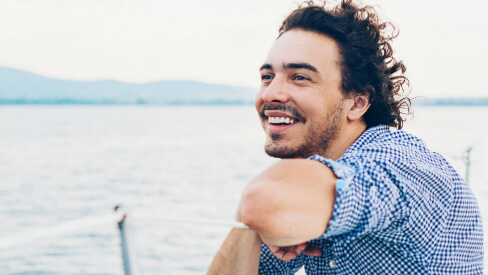 Man on a boat smiling