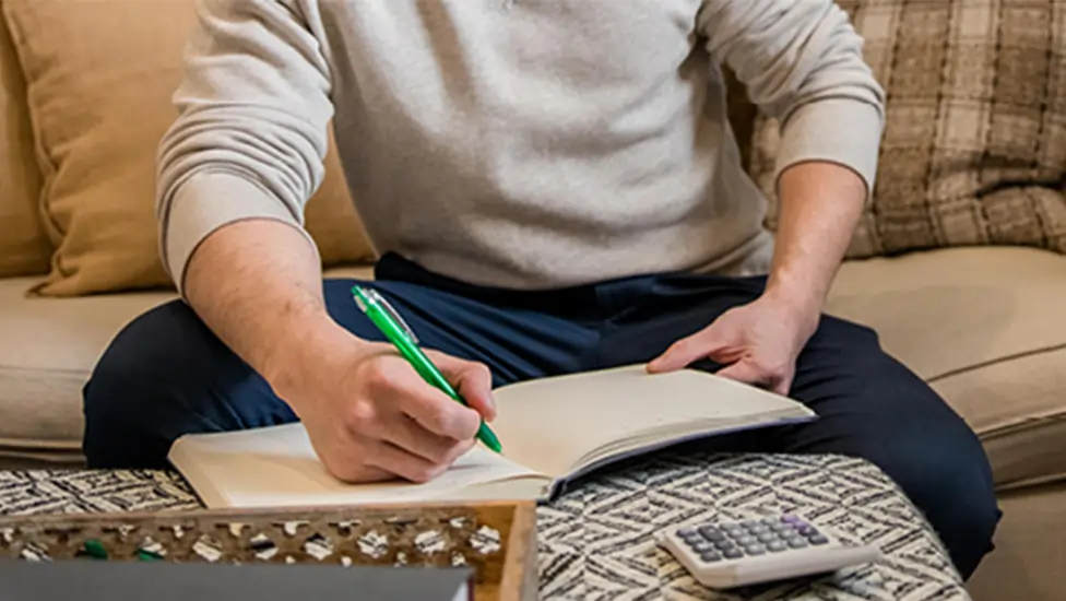 Man taking notes