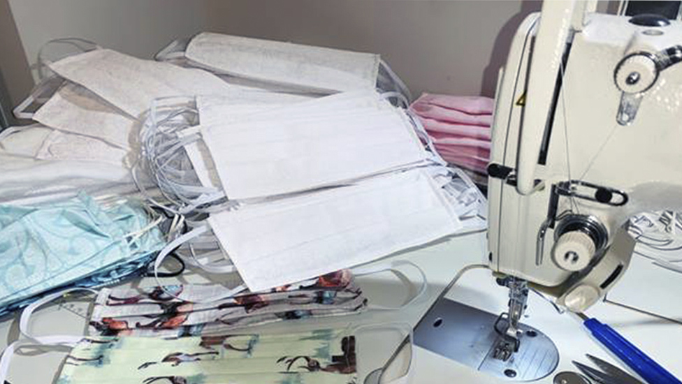image of face masks on a sewing machine