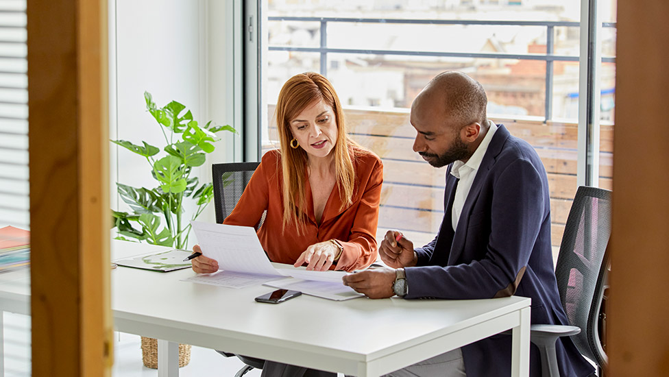 Woman and man in business meeting