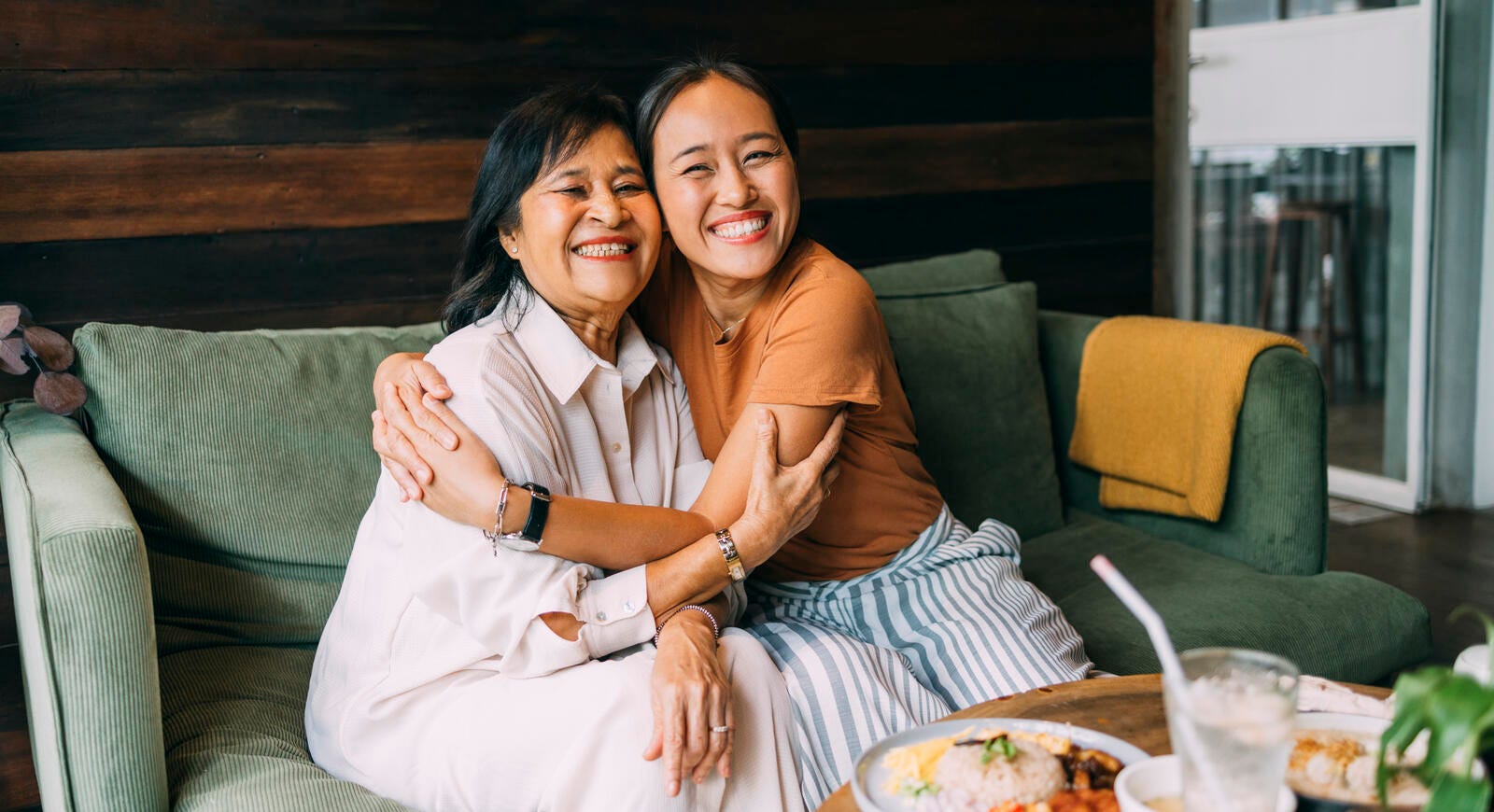 Mother and daughter hugging