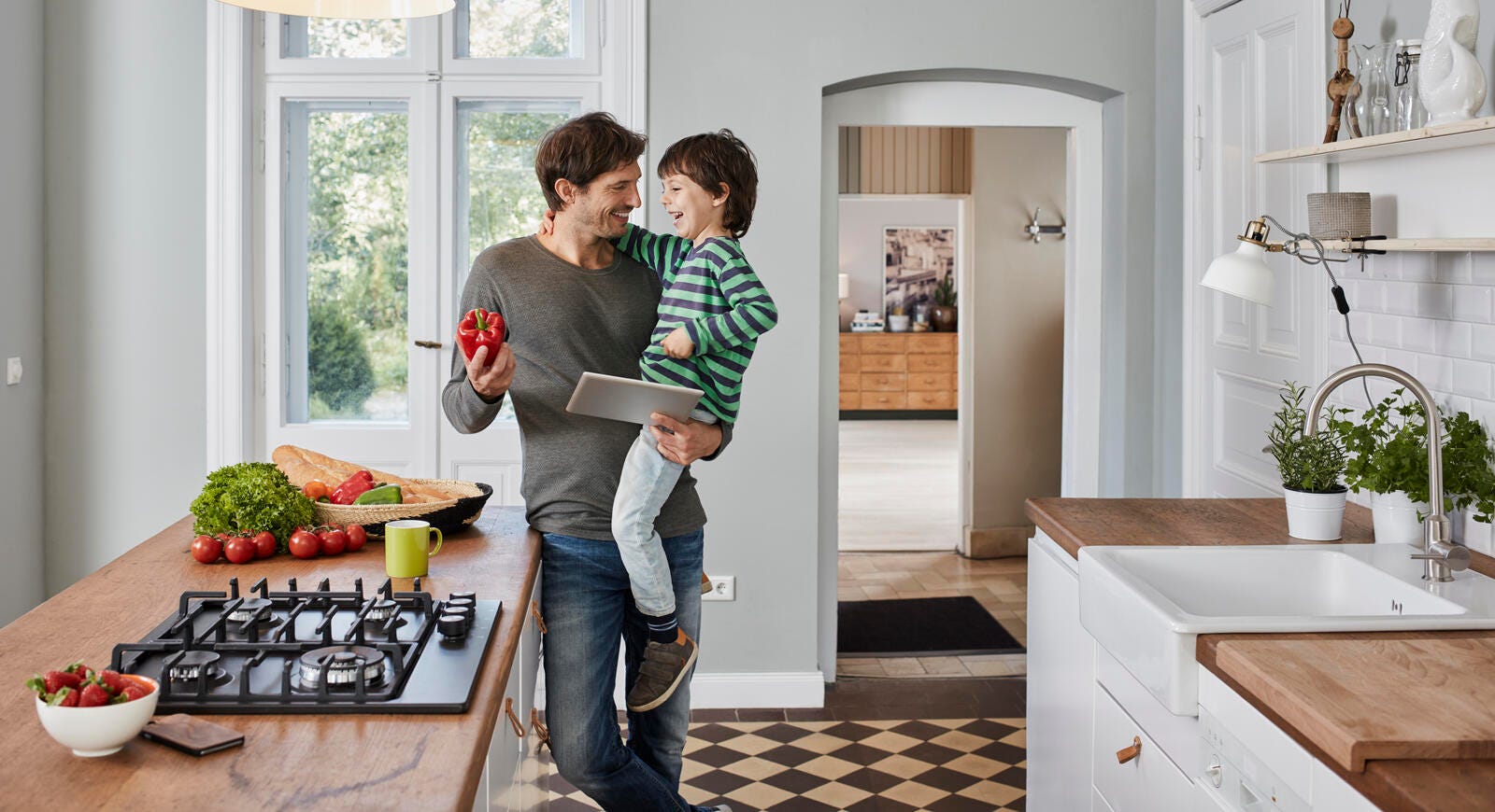Father and son in kitchen