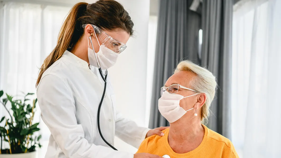 doctor holding x-ray