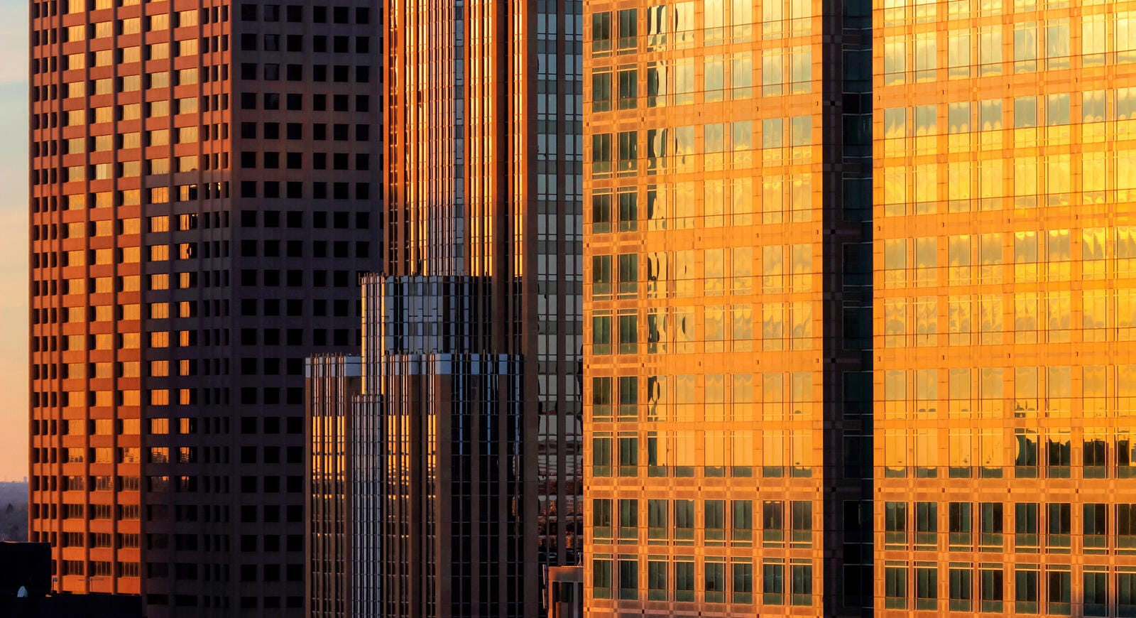 An Abstract Telephoto Close Up Detail Shot of Downtown Minneapolis Skyscrapers Reflecting Beautiful Warm Sunset Light