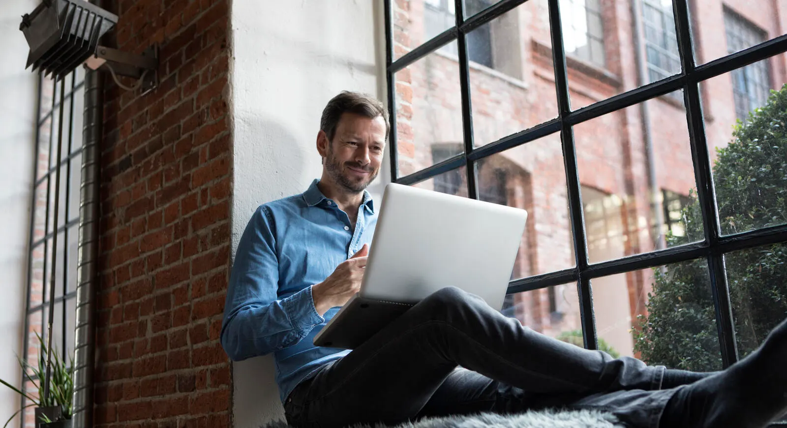 Man working on computer.