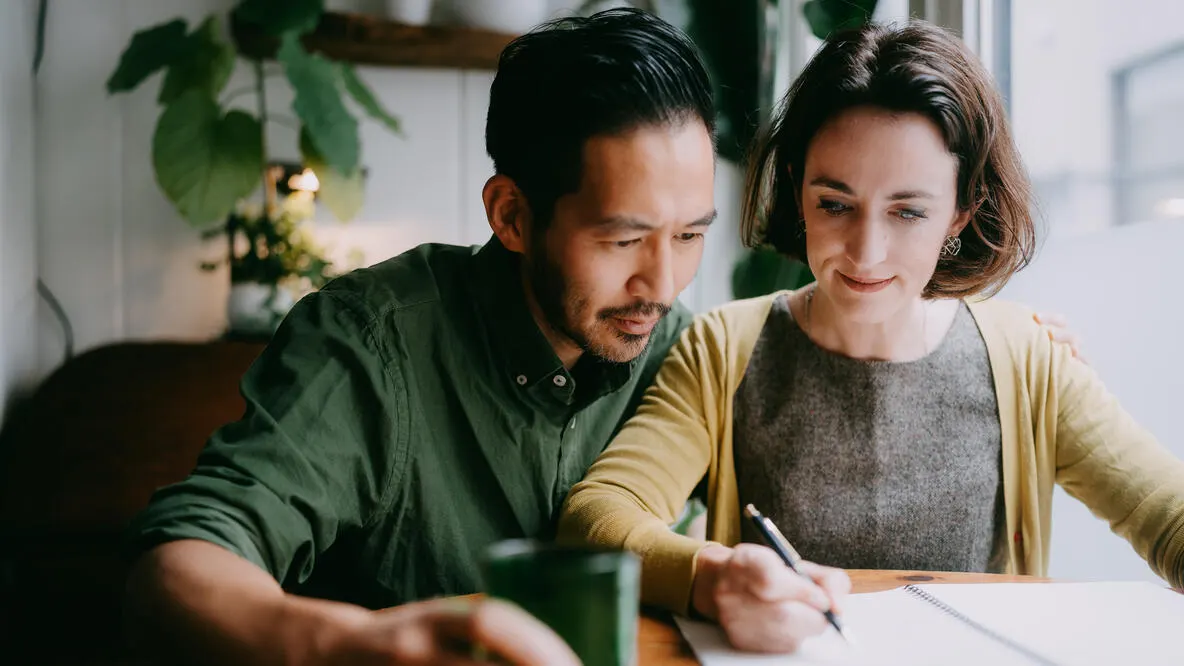 Couple planning and designing their future home