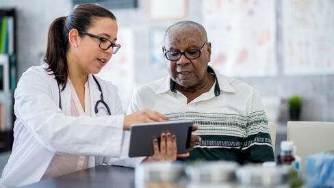 Doctor and man talking
