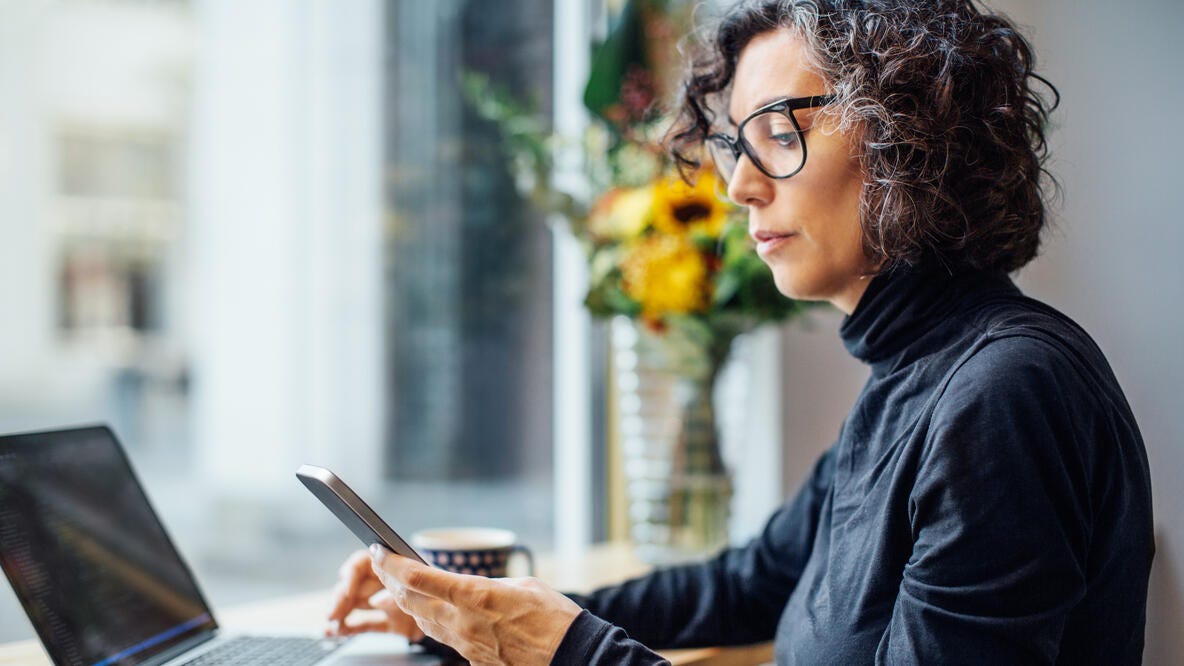A woman using her smart phone.