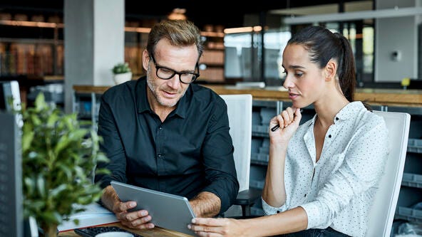 Man and woman in meeting