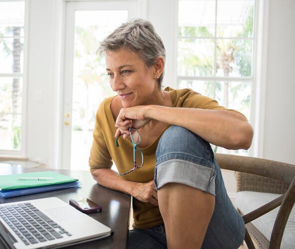 Woman at desk working on computer