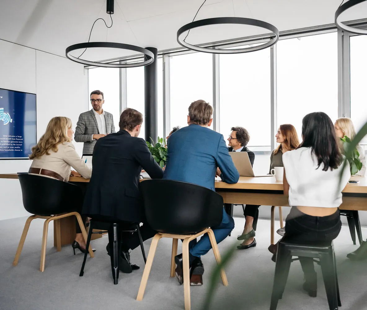 Business meeting in a bright office.
