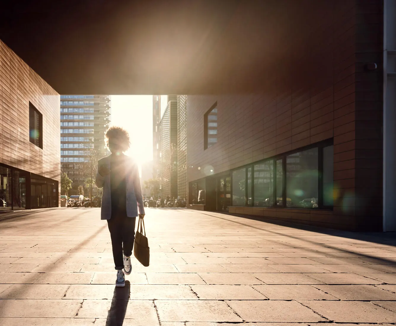 person walking near buildings