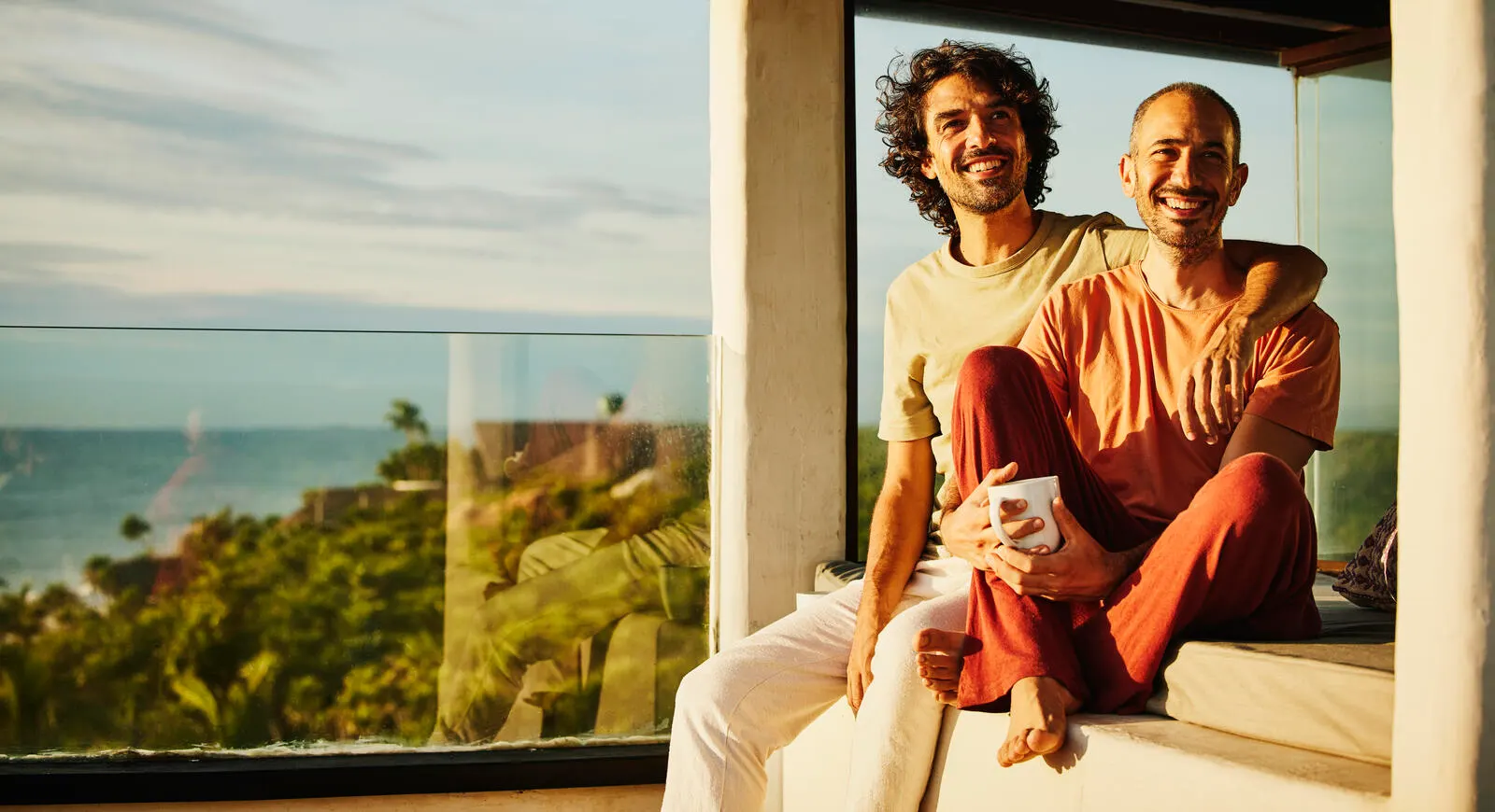 Couple sitting on rooftop deck