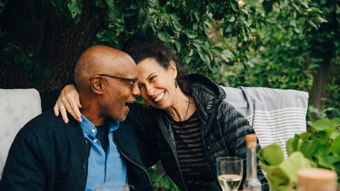 A Couple enjoying an evening at an outdoor café